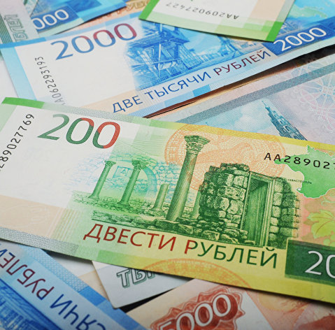 Рубль укрепляется к доллару и евро на фоне роста стоимости нефти